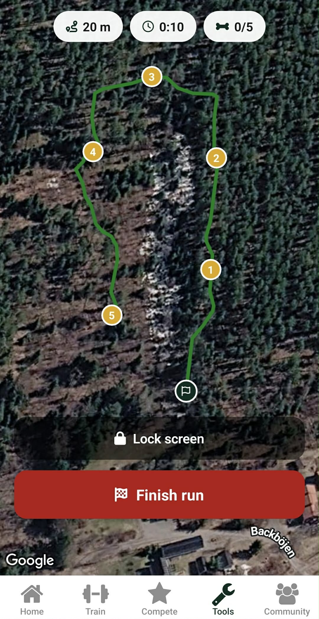 The DogStreak tracking screen with a laid track on a satellite map and numbered articles.